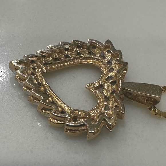 This is a yellow gold open heart diamond pendant necklace on a gold chain - Picture 5 of 8